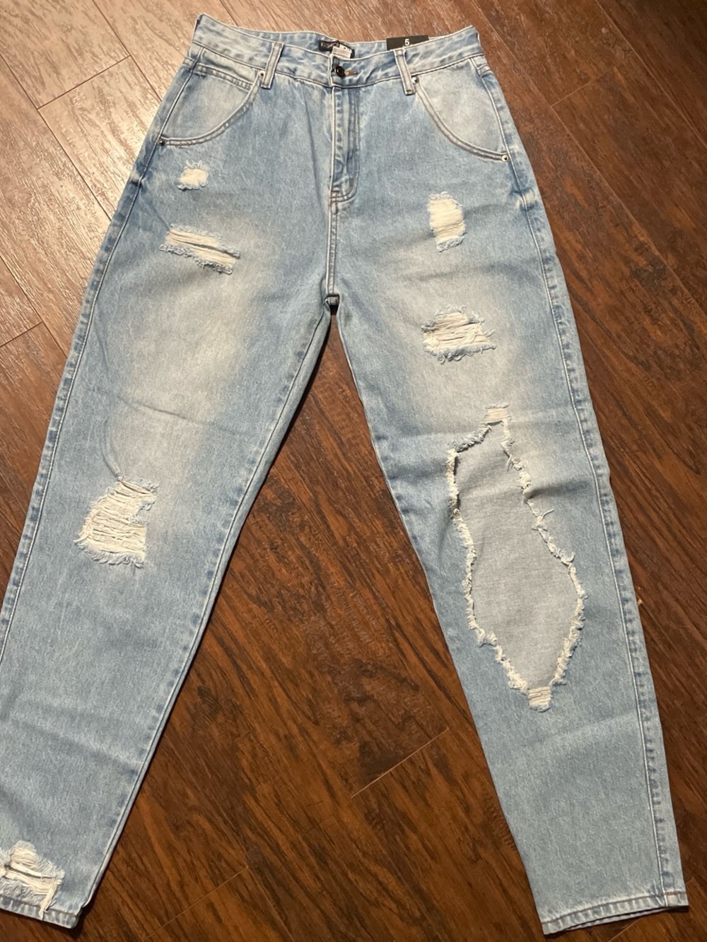 Fashion Nova Light Blue Distressed Relaxed Jeans